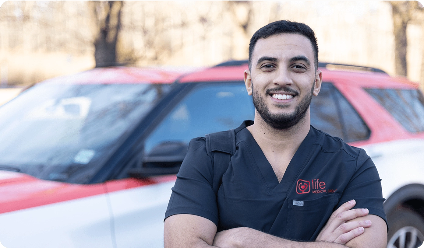 Portrait of a friendly Life Medical Group technician or nurse, ready to provide mobile health services.