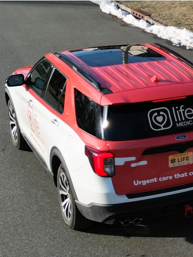 Life Medical urgent care vehicle driving to provide in-home medical services